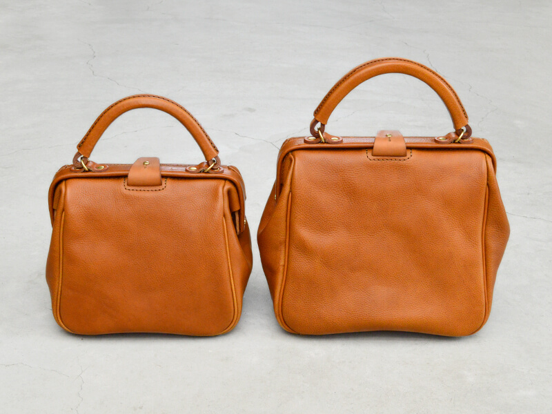 がま口タイプでレディースバッグとして大人気の口枠キューブトート