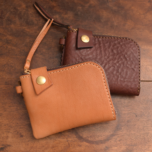 ワイルドな革の風合いが男心を擽るライオンウォレット / 革鞄のHERZ