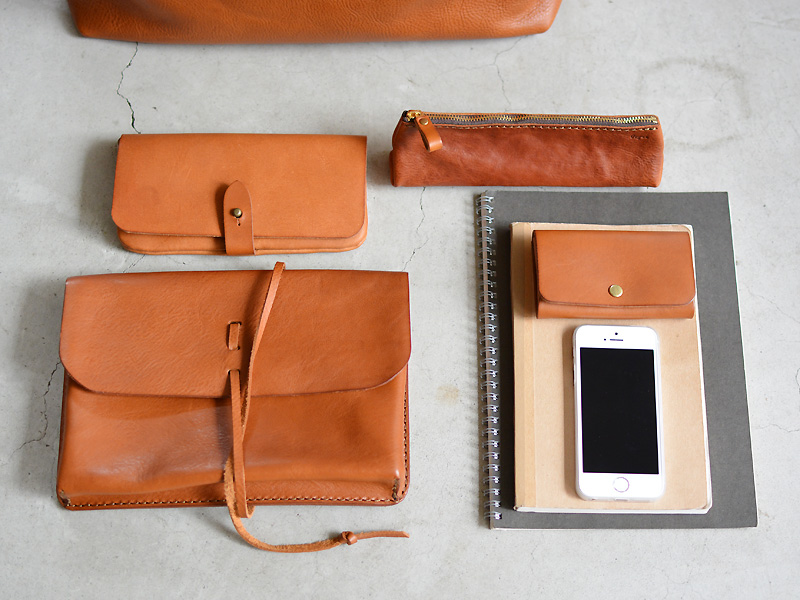 イタリア革で作ったラウンドファスナーのレディーストート / 革鞄の