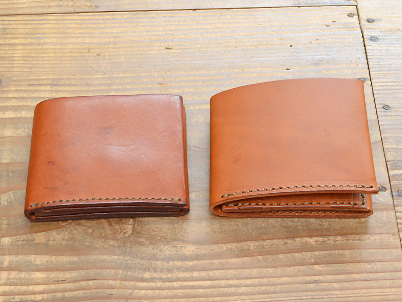 収納部分を集約しシンプルな見た目に仕上げた二つ折り財布「革鞄のHERZ 