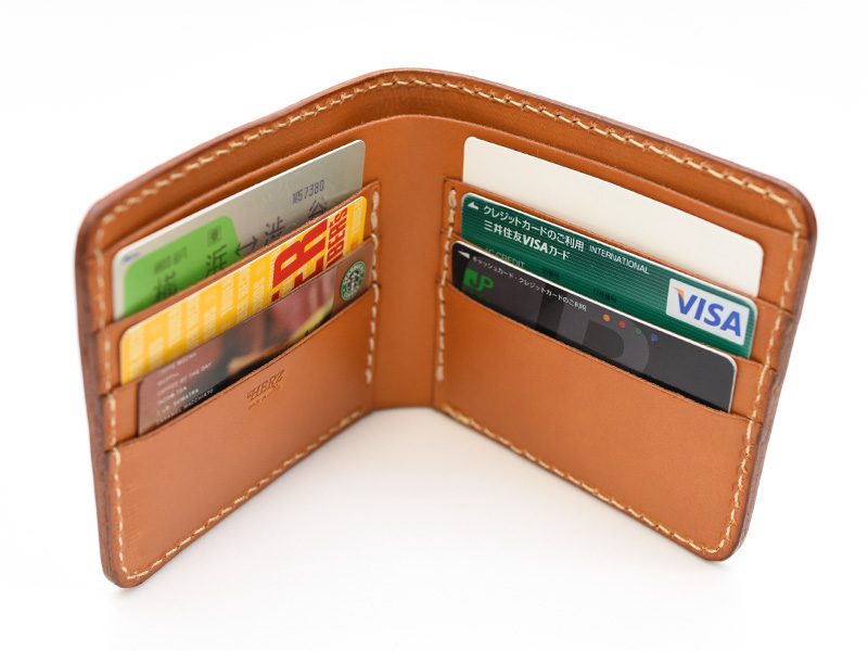 お札とカードの収納に特化したシンプル二つ折り財布「革鞄のHERZ 